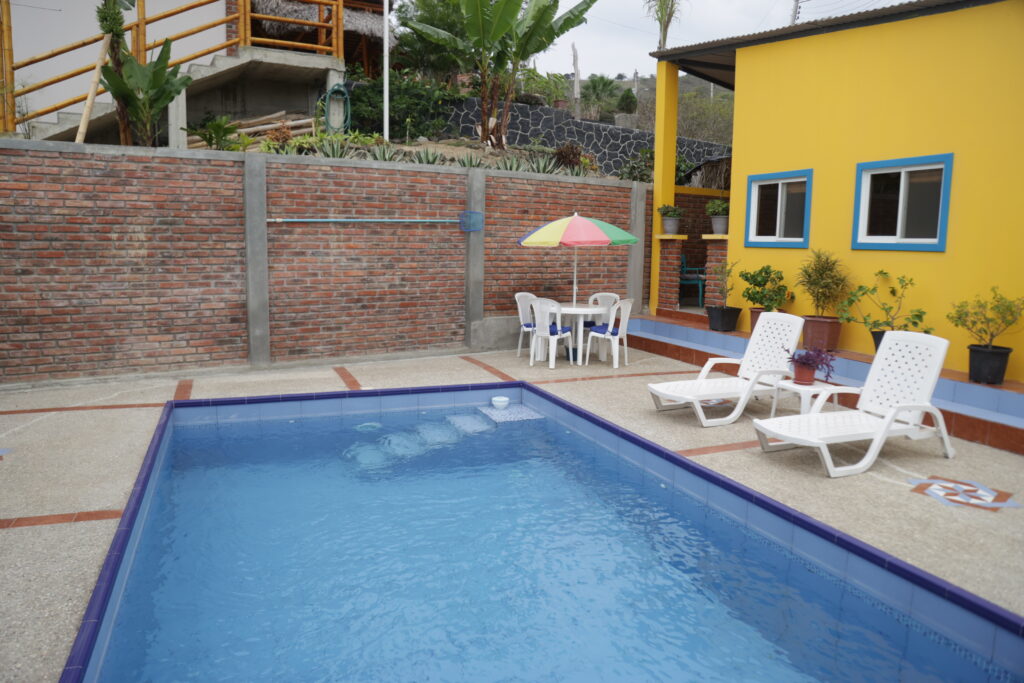 The pool and deck looking towards the guest cabaña